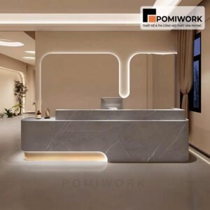 Quầy lễ tân bo góc mềm mại – Bàn tiếp tân kết hợp đèn LED hiện đại