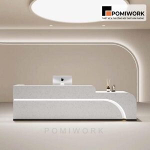 Quầy lễ tân văn phòng sang trọng – Mẫu bàn tiếp tân tone sáng, ánh sáng LED tinh tế